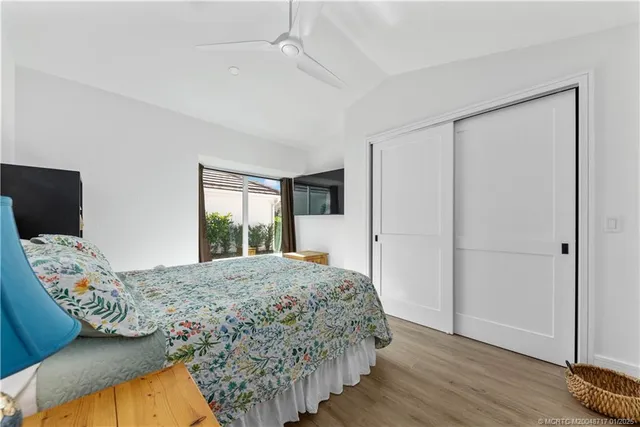 a bathroom with a toilet a sink and a mirror