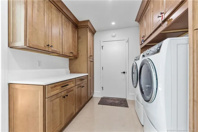 a view of a porch with a table and chairs