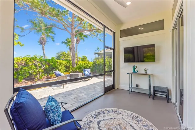 a aerial view of a house with a yard