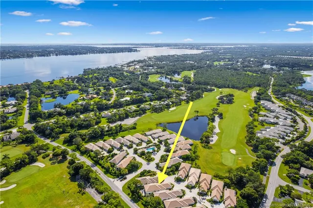 a view of a lake with a city