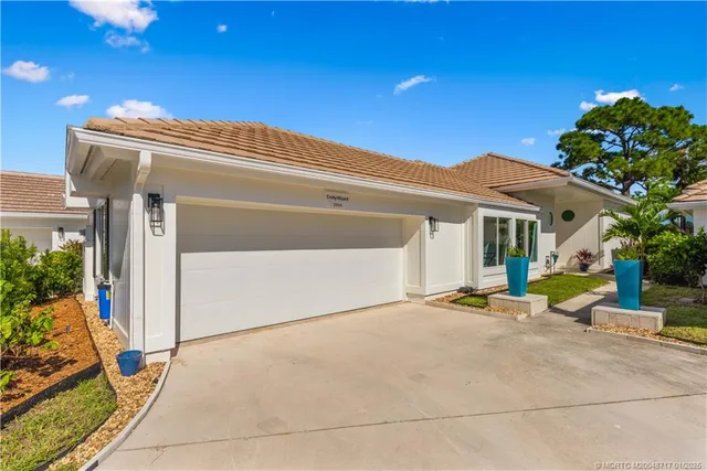 a view of house with outdoor space and porch