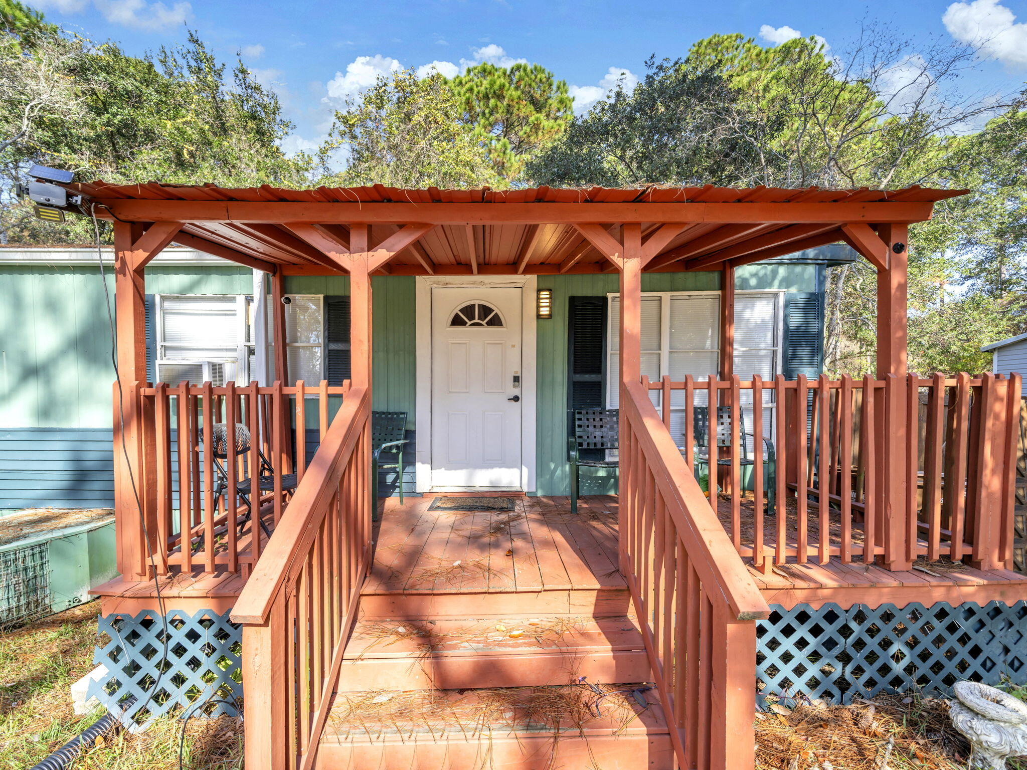 9028 Larker Woods Road Navarre, FL 32566 - Photo 1 of 36 a view of outdoor space yard deck patio and deck