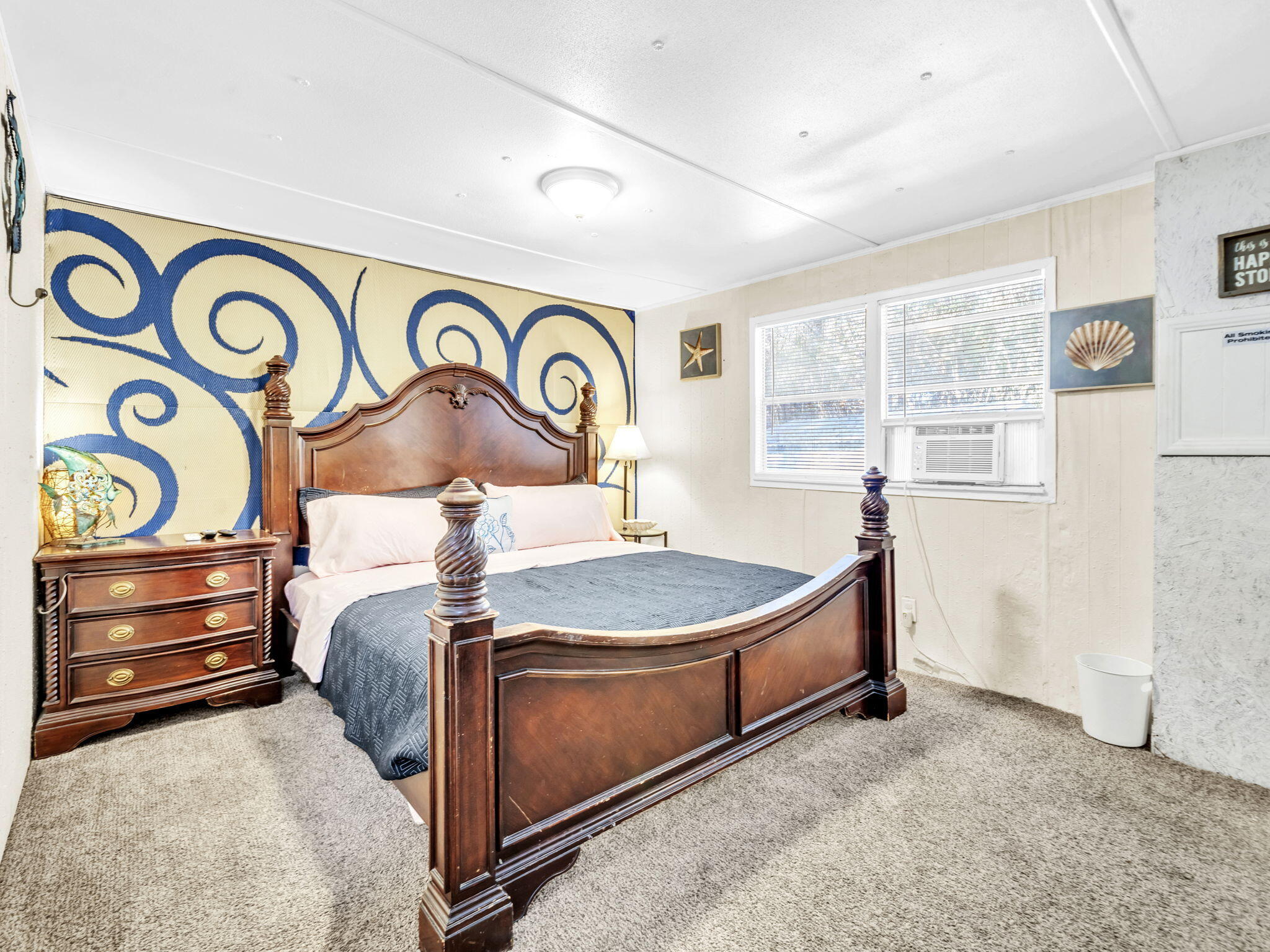 9028 Larker Woods Road Navarre, FL 32566 - Photo 21 of 36 a bedroom with a bed and a dresser