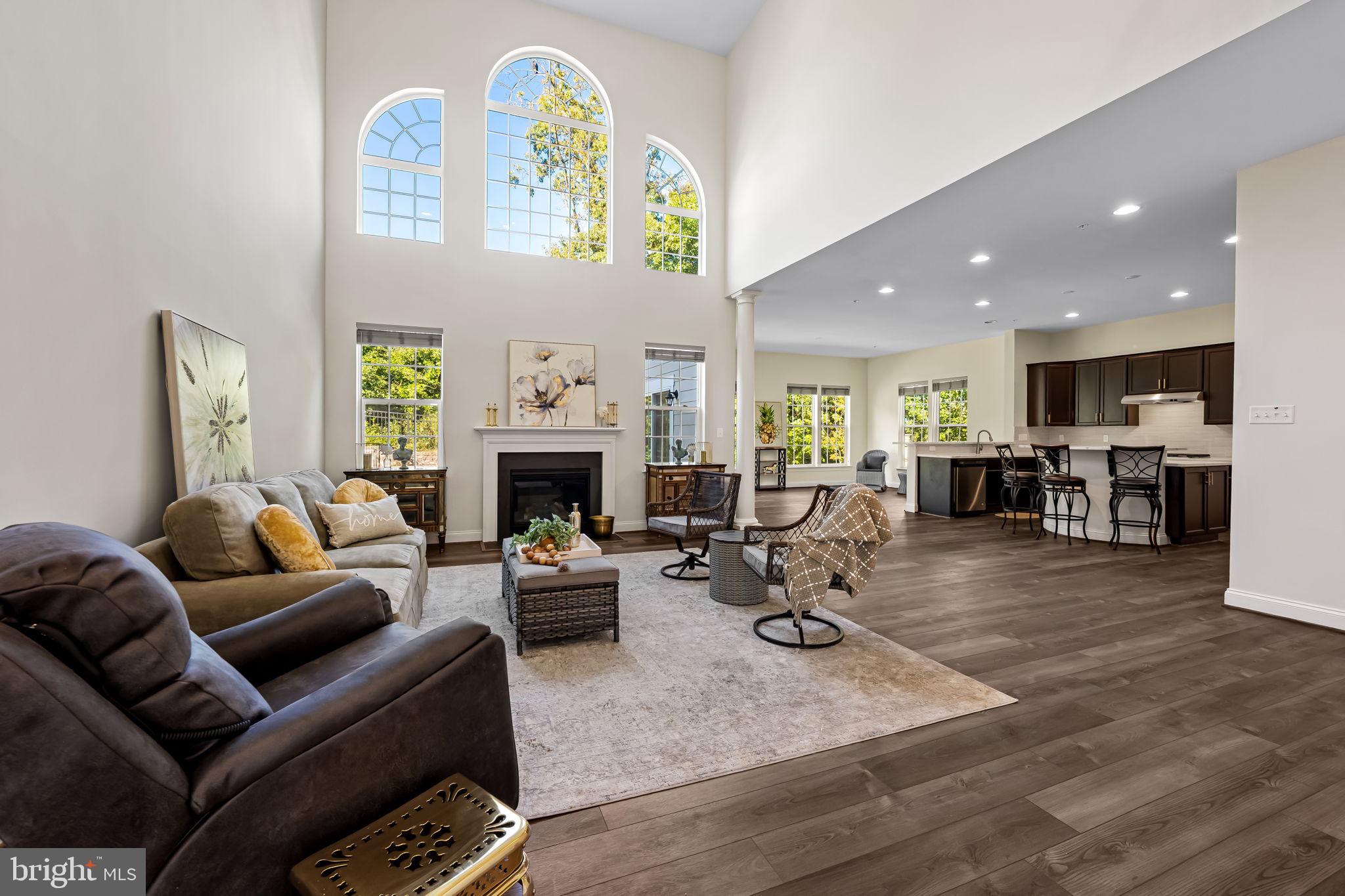 6352 Islington Street Middle River, MD 21220 - Photo 14 of 58 a living room with furniture fireplace and a table