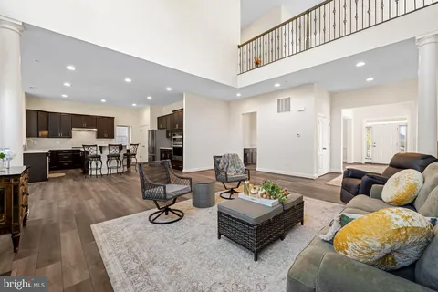a living room with furniture and windows