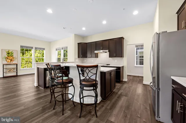 a kitchen with a stove and a sink