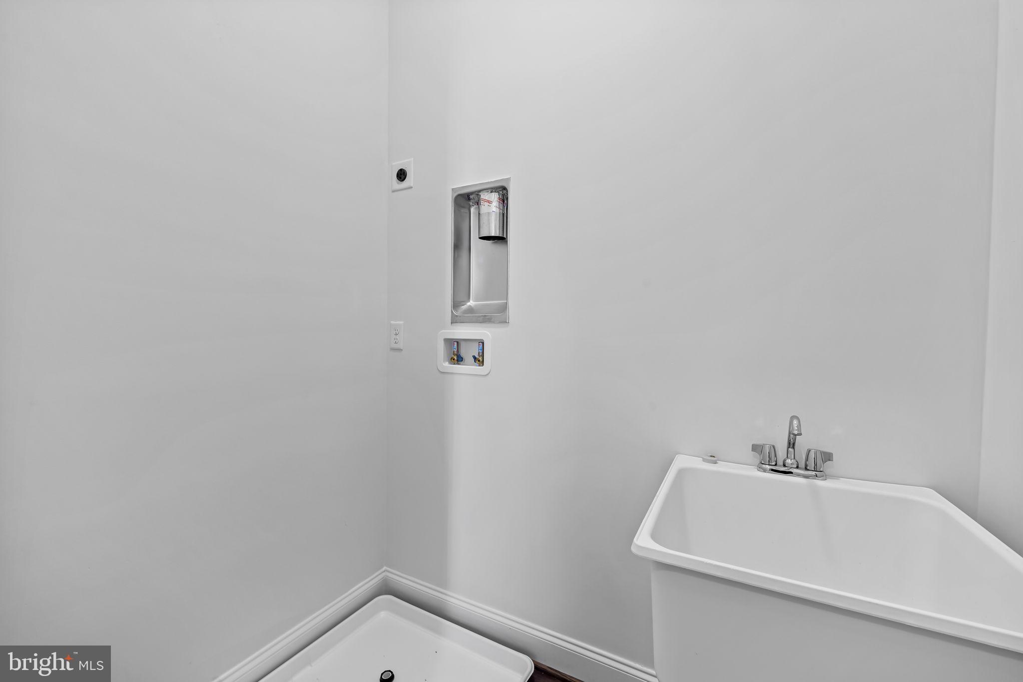 6352 Islington Street Middle River, MD 21220 - Photo 23 of 58 a bathroom with a bathtub