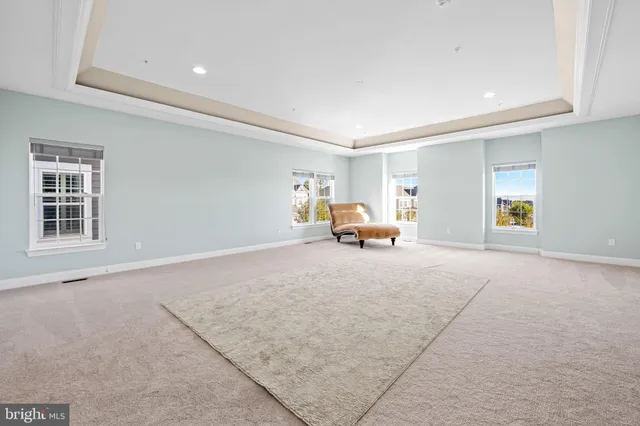 a bathroom with a tub a sink and a shower