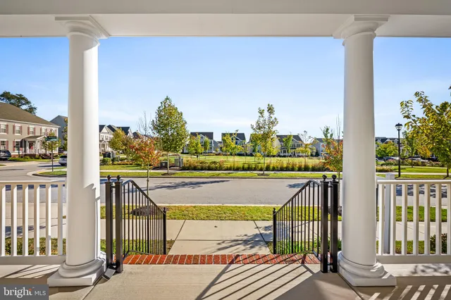 a view of a balcony with furniture