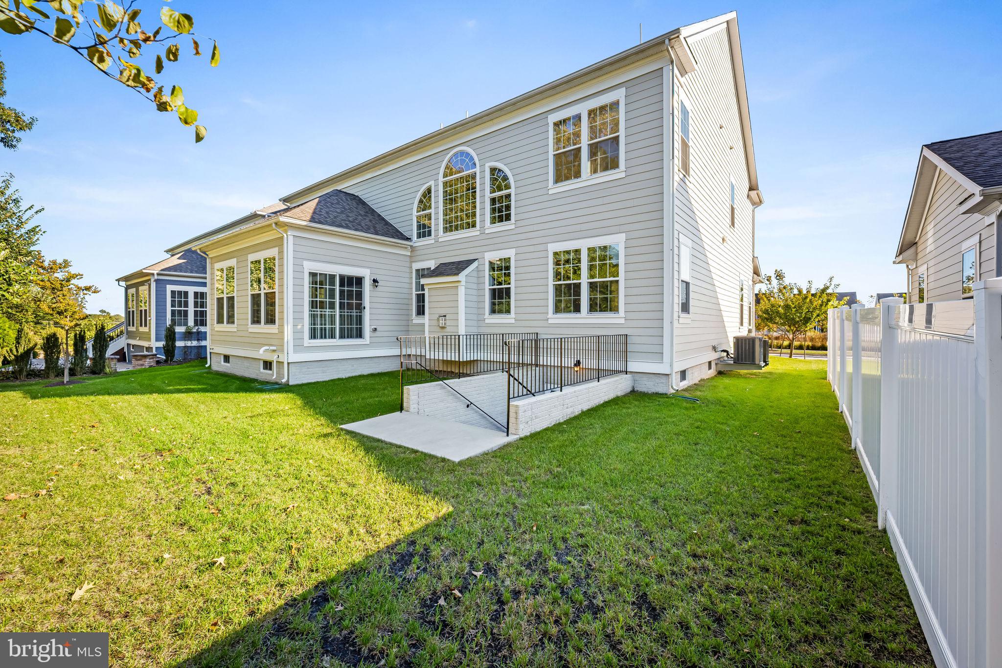 6352 Islington Street Middle River, MD 21220 - Photo 45 of 58 a front view of a house with swimming pool having outdoor seating