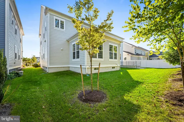 a view of a kitchen with a sink and a stove