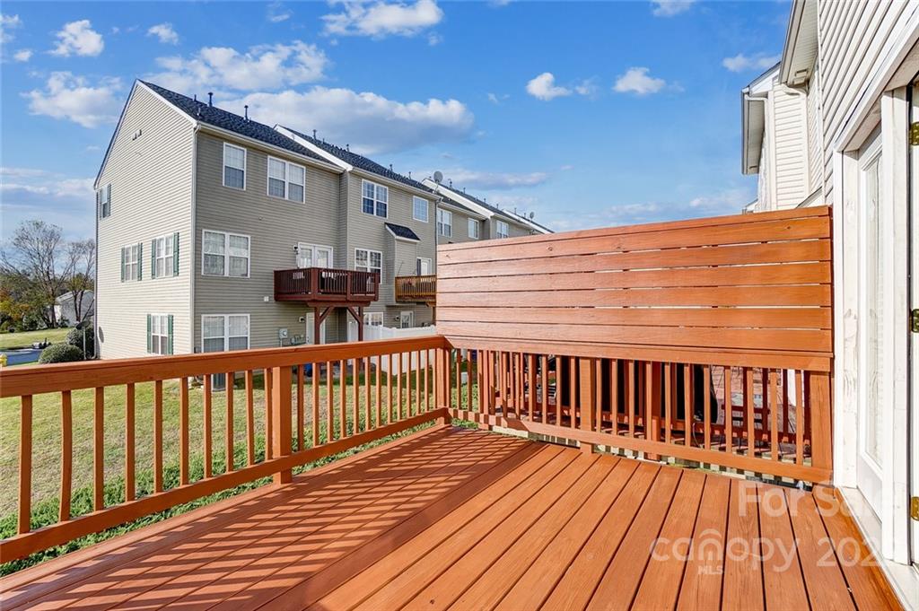 144 Rock Ridge Lane Mount Holly, NC 28120 - Photo 19 of 48 a view of wooden balcony with a barbeque