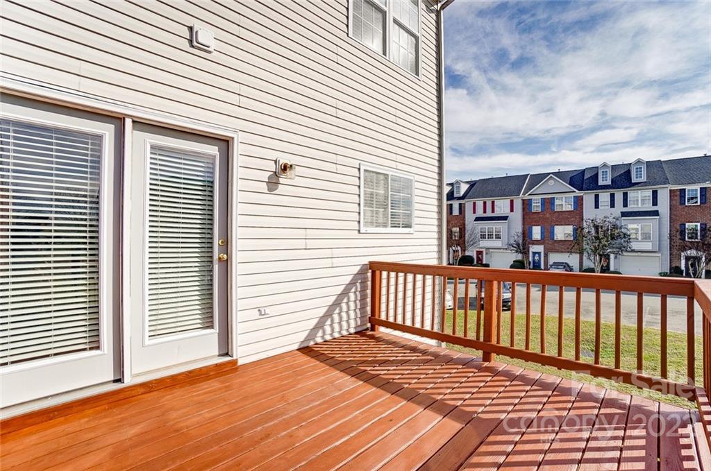 144 Rock Ridge Lane Mount Holly, NC 28120 - Photo 20 of 48 a view of a balcony with a barbeque