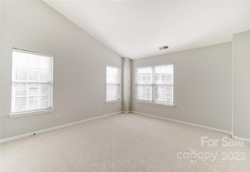 144 Rock Ridge Lane Mount Holly, NC 28120 - Photo 23 of 48 a view of an empty room with a window