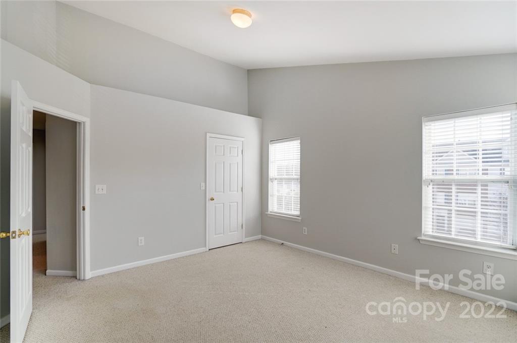 144 Rock Ridge Lane Mount Holly, NC 28120 - Photo 24 of 48 a view of an empty room with a window