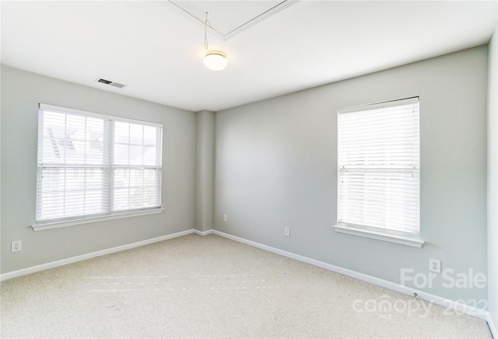 144 Rock Ridge Lane Mount Holly, NC 28120 - Photo 31 of 48 an empty room with a window