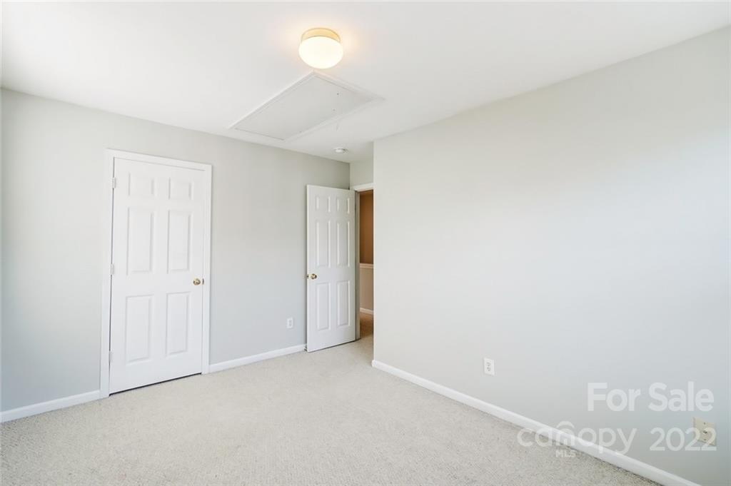 144 Rock Ridge Lane Mount Holly, NC 28120 - Photo 32 of 48 a view of an empty room
