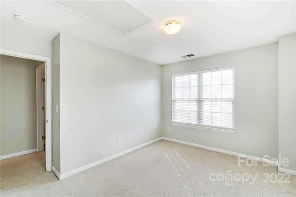 144 Rock Ridge Lane Mount Holly, NC 28120 - Photo 33 of 48 an empty room with a window