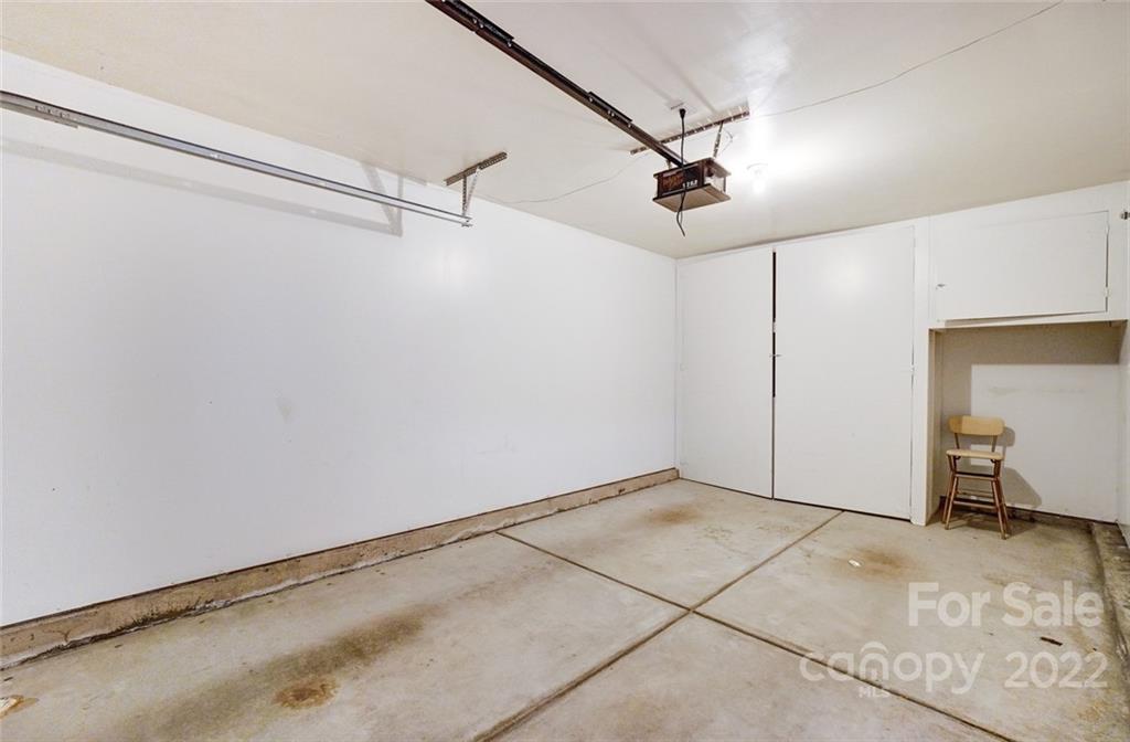 144 Rock Ridge Lane Mount Holly, NC 28120 - Photo 39 of 48 a view of a room with rack on the wall