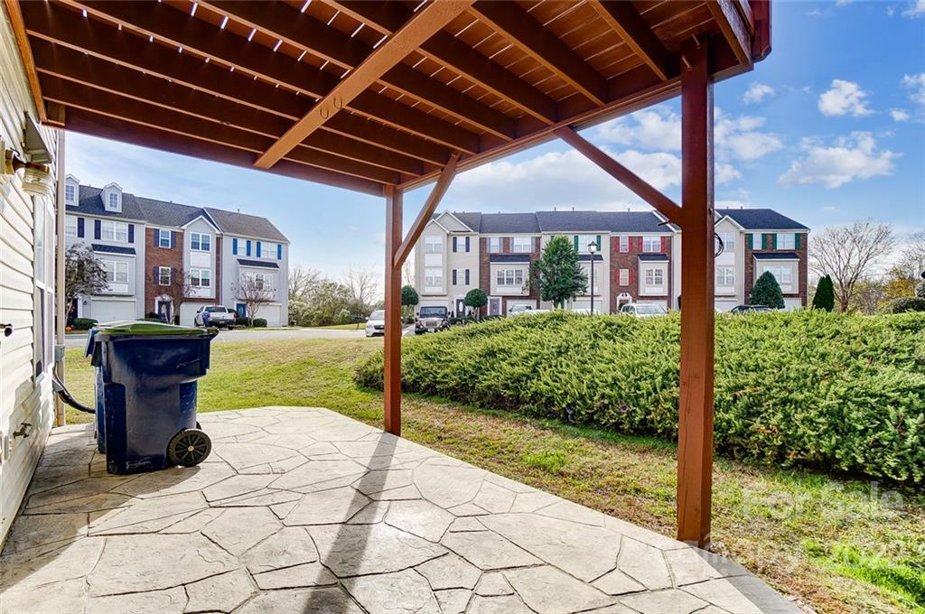 144 Rock Ridge Lane Mount Holly, NC 28120 - Photo 41 of 48 a view of a porch with wooden fence