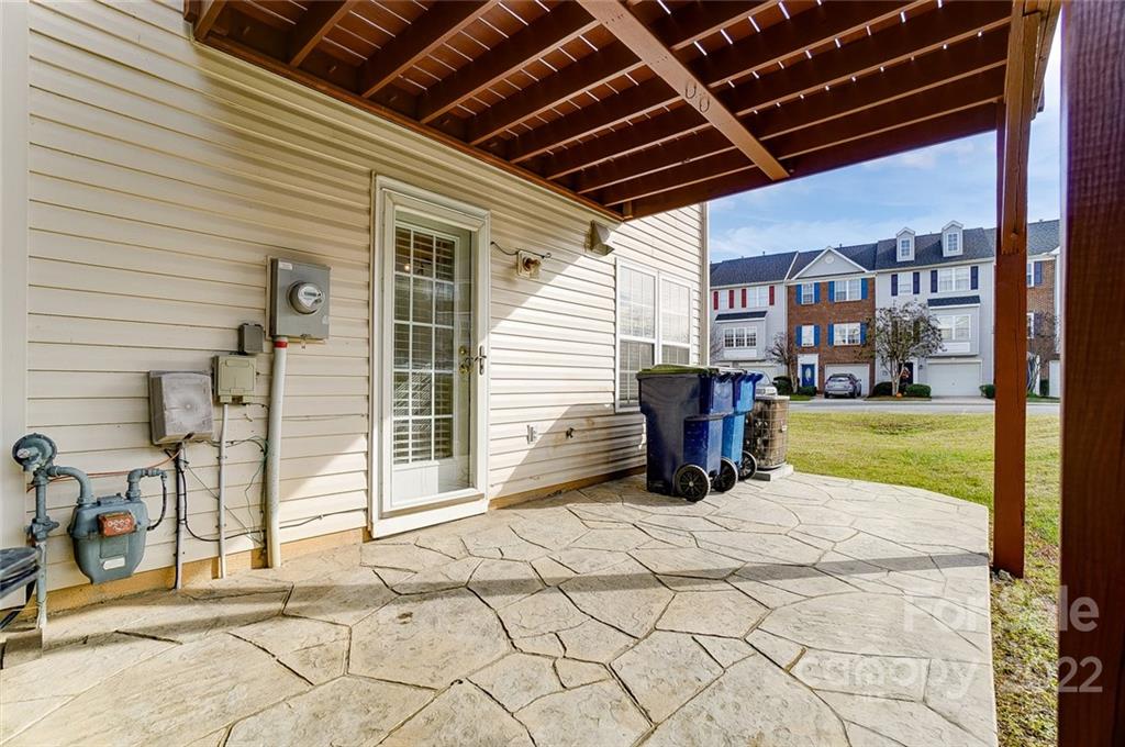 144 Rock Ridge Lane Mount Holly, NC 28120 - Photo 42 of 48 a view of a porch with garden