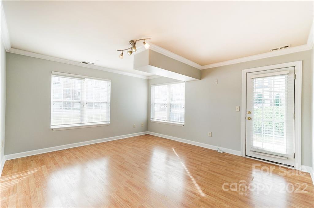 144 Rock Ridge Lane Mount Holly, NC 28120 - Photo 6 of 48 a view of an empty room with a window