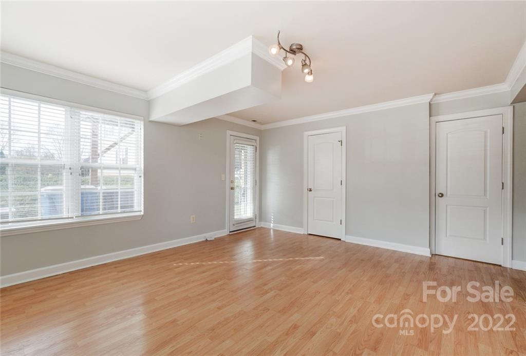 144 Rock Ridge Lane Mount Holly, NC 28120 - Photo 7 of 48 a view of an empty room with a window