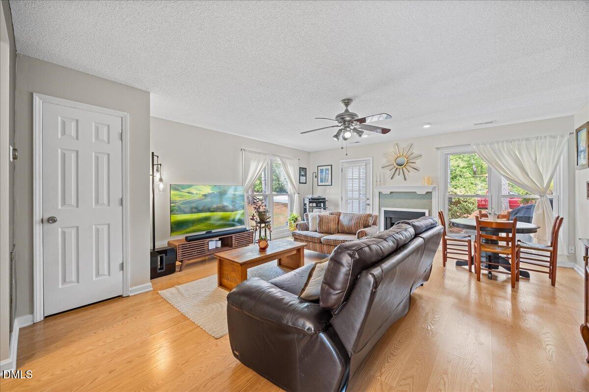 501 Darby Glen Lane Durham, NC 27713 - Photo 10 of 25 a living room with furniture and a large window