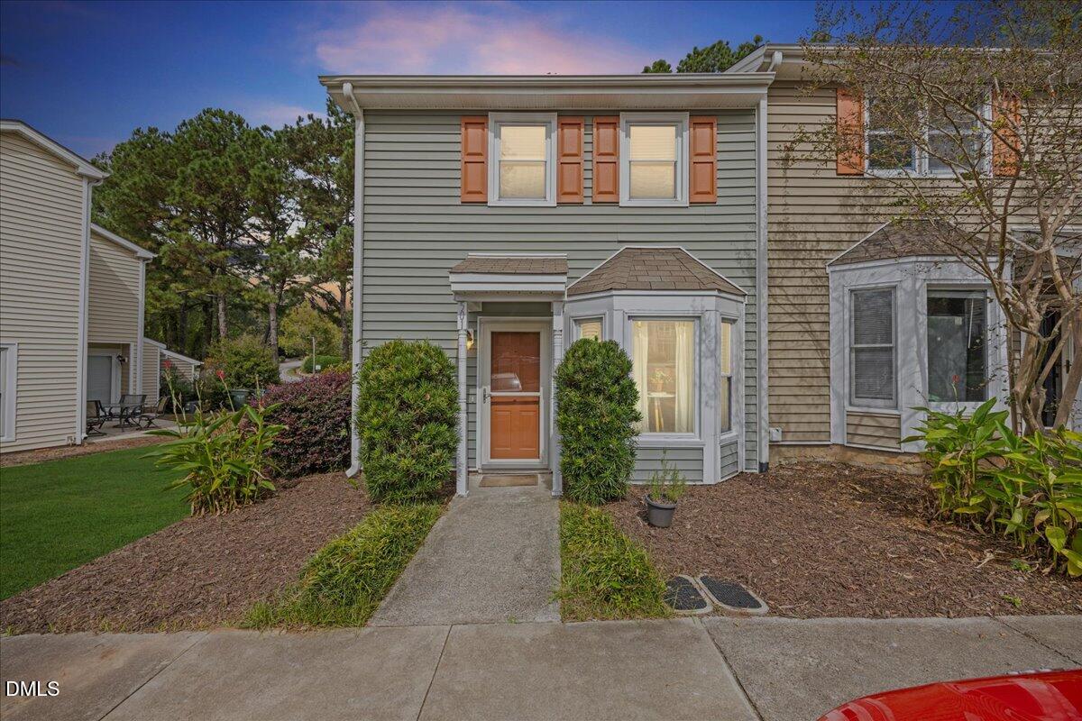 501 Darby Glen Lane Durham, NC 27713 - Photo 2 of 25 a front view of house with yard and green space