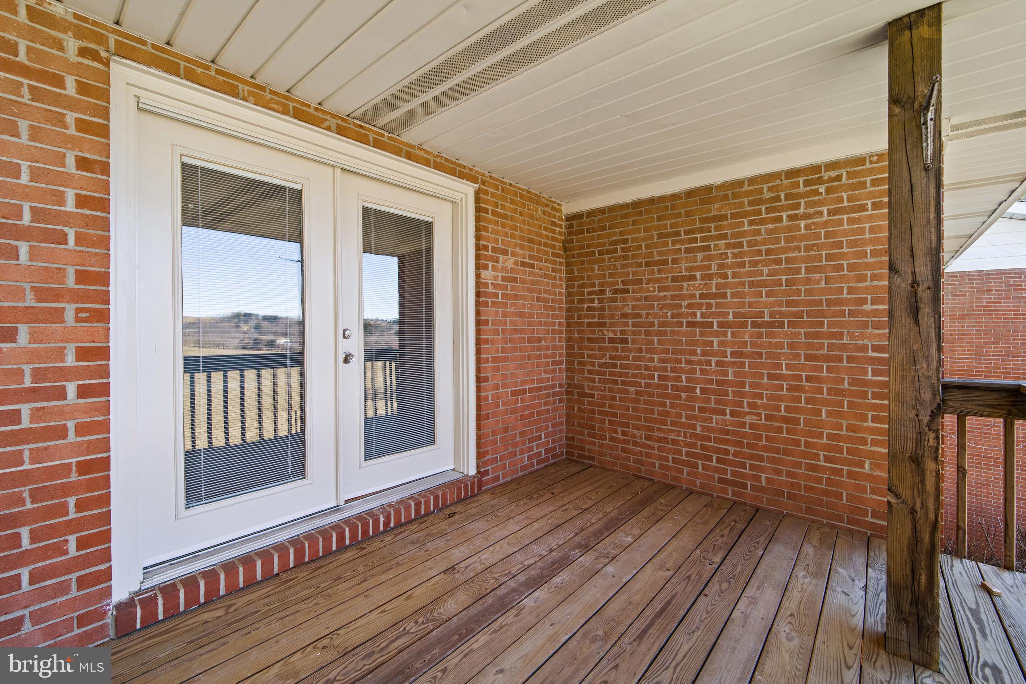 8030 Cannonball Gate Road Warrenton, VA 20186 - Photo 52 of 62 porch off bedroom