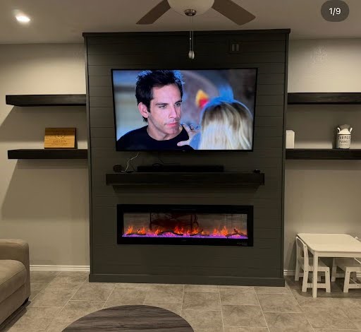 7518 Cynomys Court Rosharon, TX 77583 - Photo 4 of 21 a fireplace with stainless steel appliances