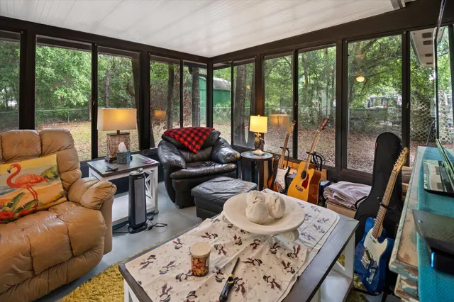 a view of an empty room with a large window