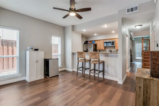 a view of a kitchen and dining room
