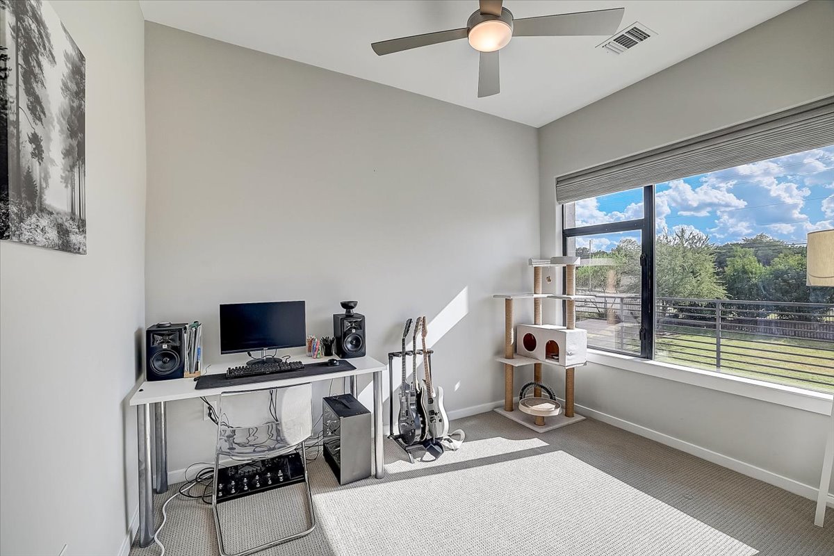 5921 Hiline Road, Unit 1204 Austin, TX 78734 - Photo 16 of 36 Carpeted office space featuring baseboards and ceiling fan