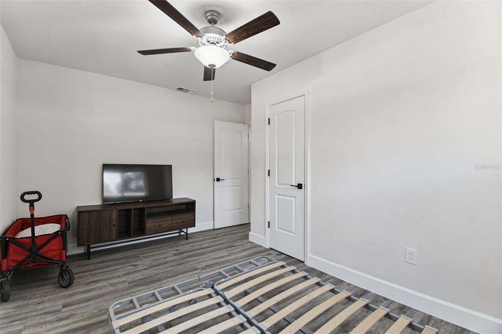4706 Catherine Street New Port Richey, FL 34652 - Photo 21 of 45 a view of livingroom with hardwood floor and furniture