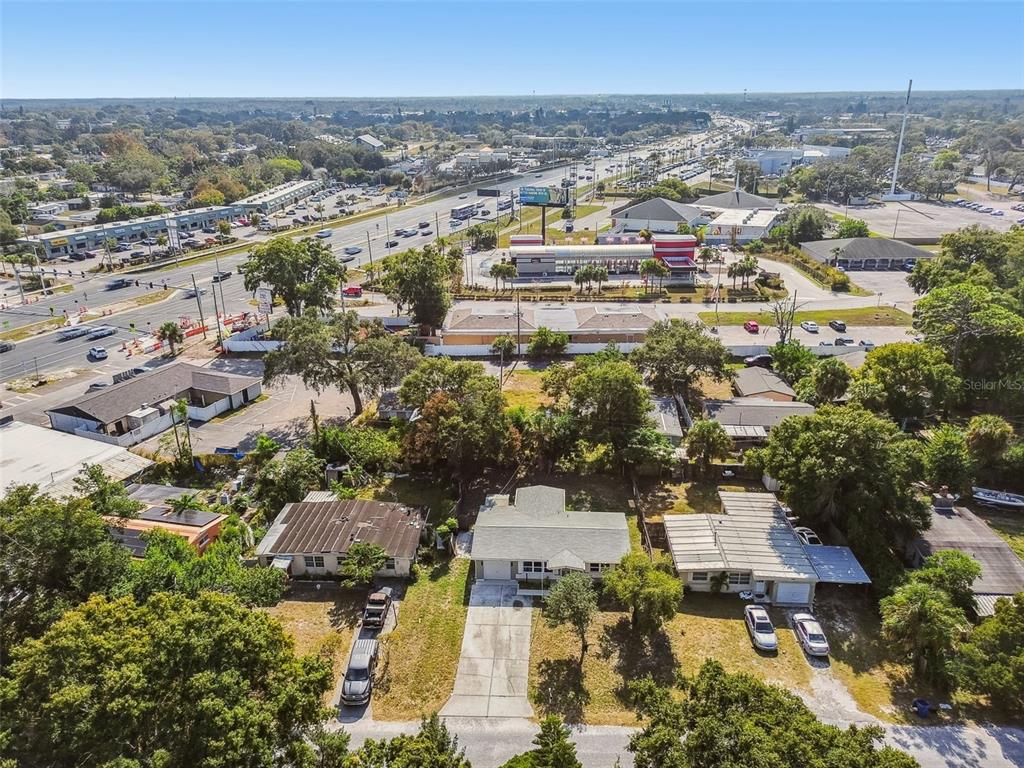 4706 Catherine Street New Port Richey, FL 34652 - Photo 37 of 45 an aerial view of residential building with green space