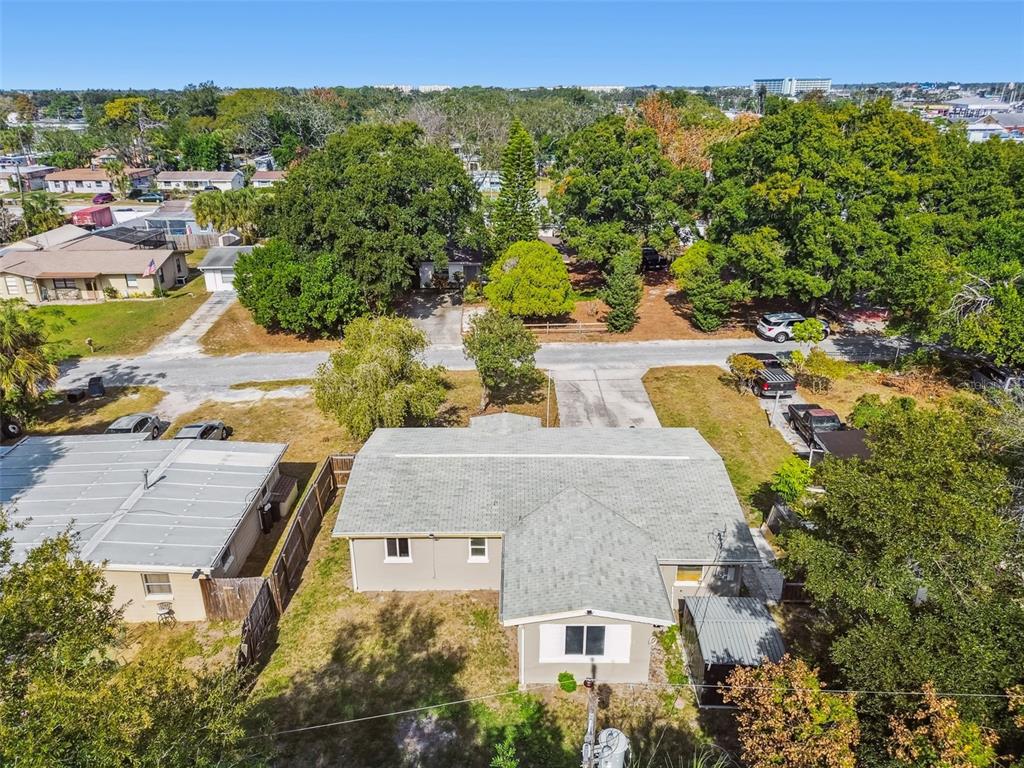 4706 Catherine Street New Port Richey, FL 34652 - Photo 38 of 45 an aerial view of a house with a yard