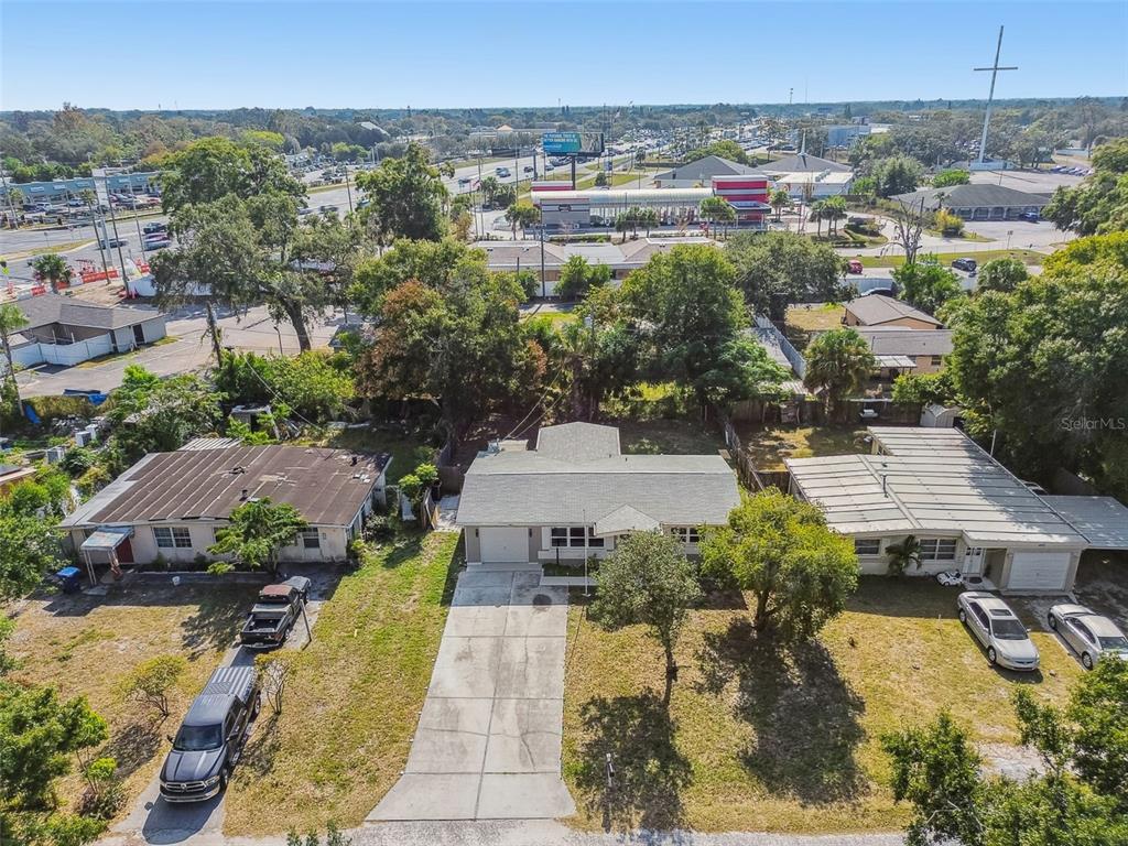 4706 Catherine Street New Port Richey, FL 34652 - Photo 44 of 45 an aerial view of a house with a yard