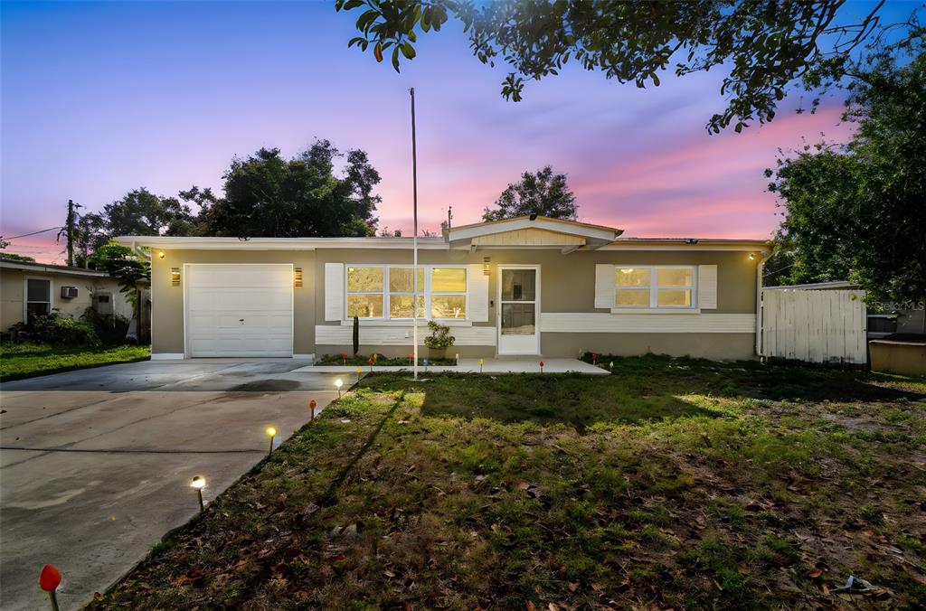 4706 Catherine Street New Port Richey, FL 34652 - Photo 45 of 45 a front view of a house with garden