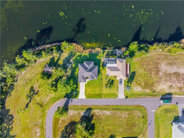 swimming pool view with garden