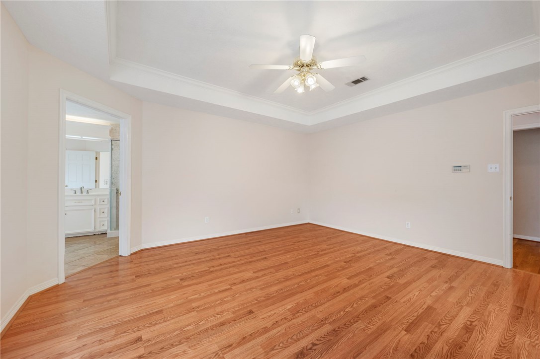 713 Willow Loop College Station, TX 77845 - Photo 16 of 39 a view of empty room with wooden floor