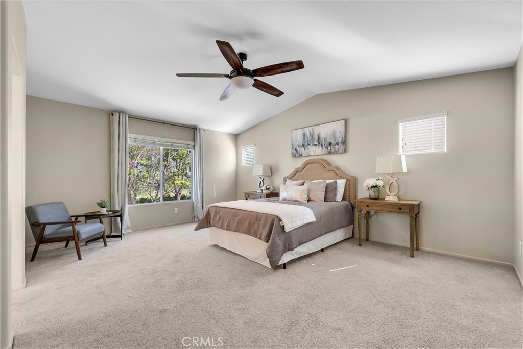 12351 Mesa Grove Drive Riverside, CA 92503 - Photo 15 of 25 a bed room with a bed and a chair