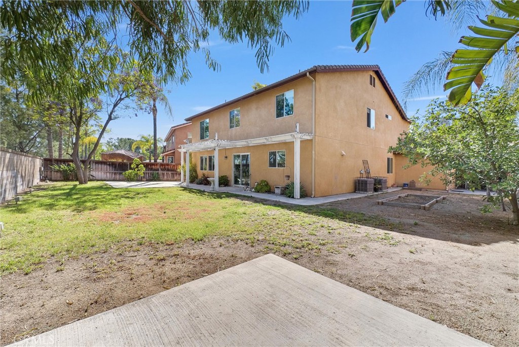 12351 Mesa Grove Drive Riverside, CA 92503 - Photo 20 of 25 a view of a house with a yard
