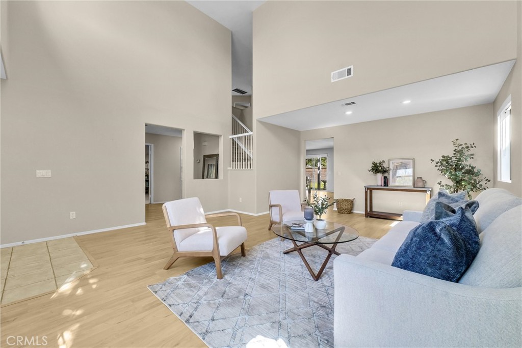 12351 Mesa Grove Drive Riverside, CA 92503 - Photo 2 of 25 a living room with furniture and wooden floor