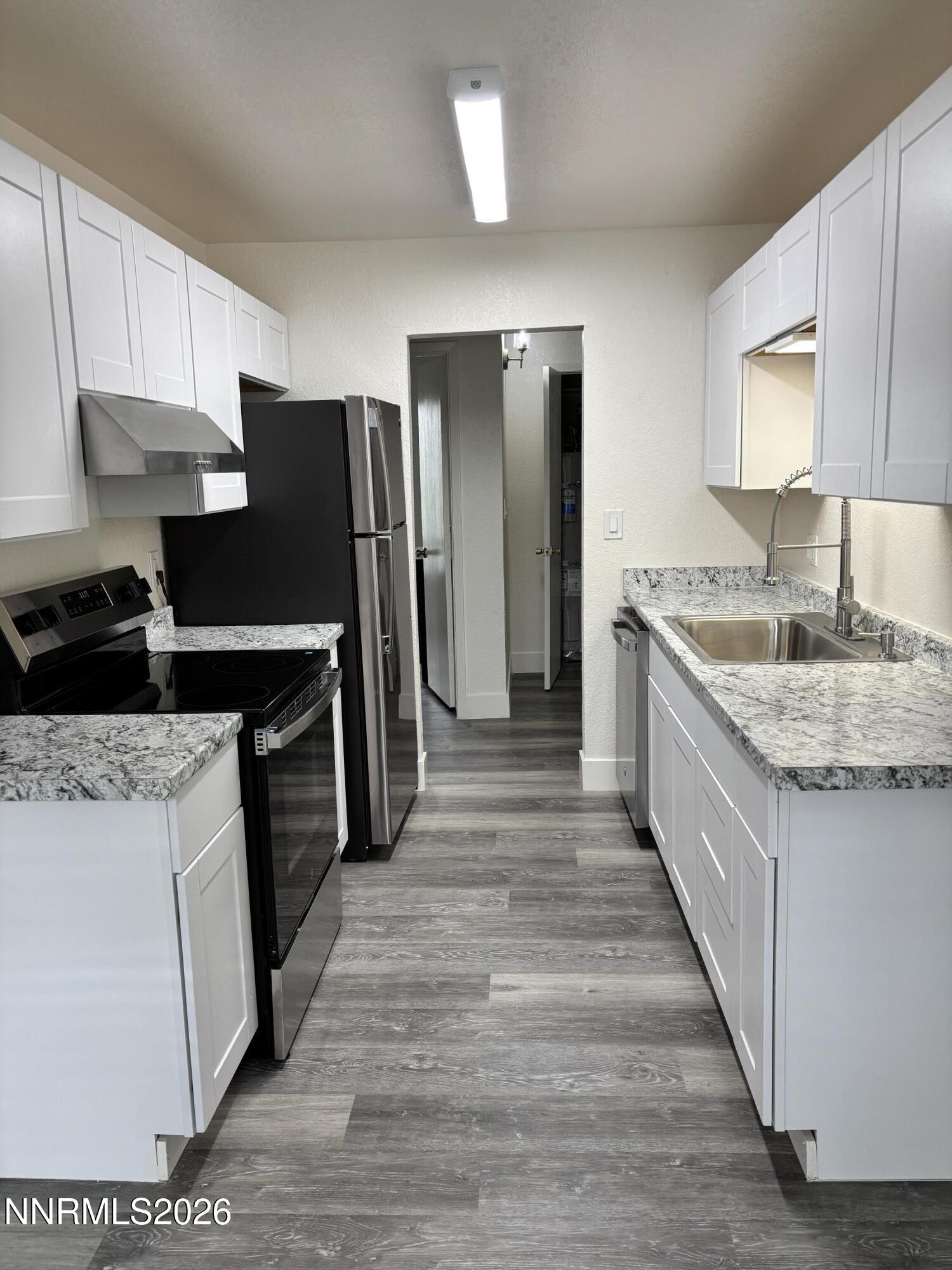 3909 Clear Acre Lane, Unit 33 Reno, NV 89512 - Photo 4 of 17 3909 Clear Acre - Kitchen