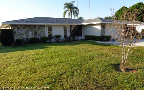 238 Sheppard Road Northwest Lake Placid, FL 33852 - Photo 1 of 1 a front view of house with yard