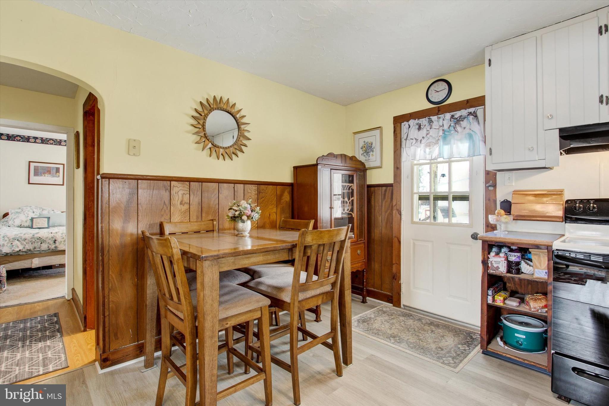 371 Maple Avenue Hanover, PA 17331 - Photo 12 of 24 a view of a dining room with furniture and a kitchen