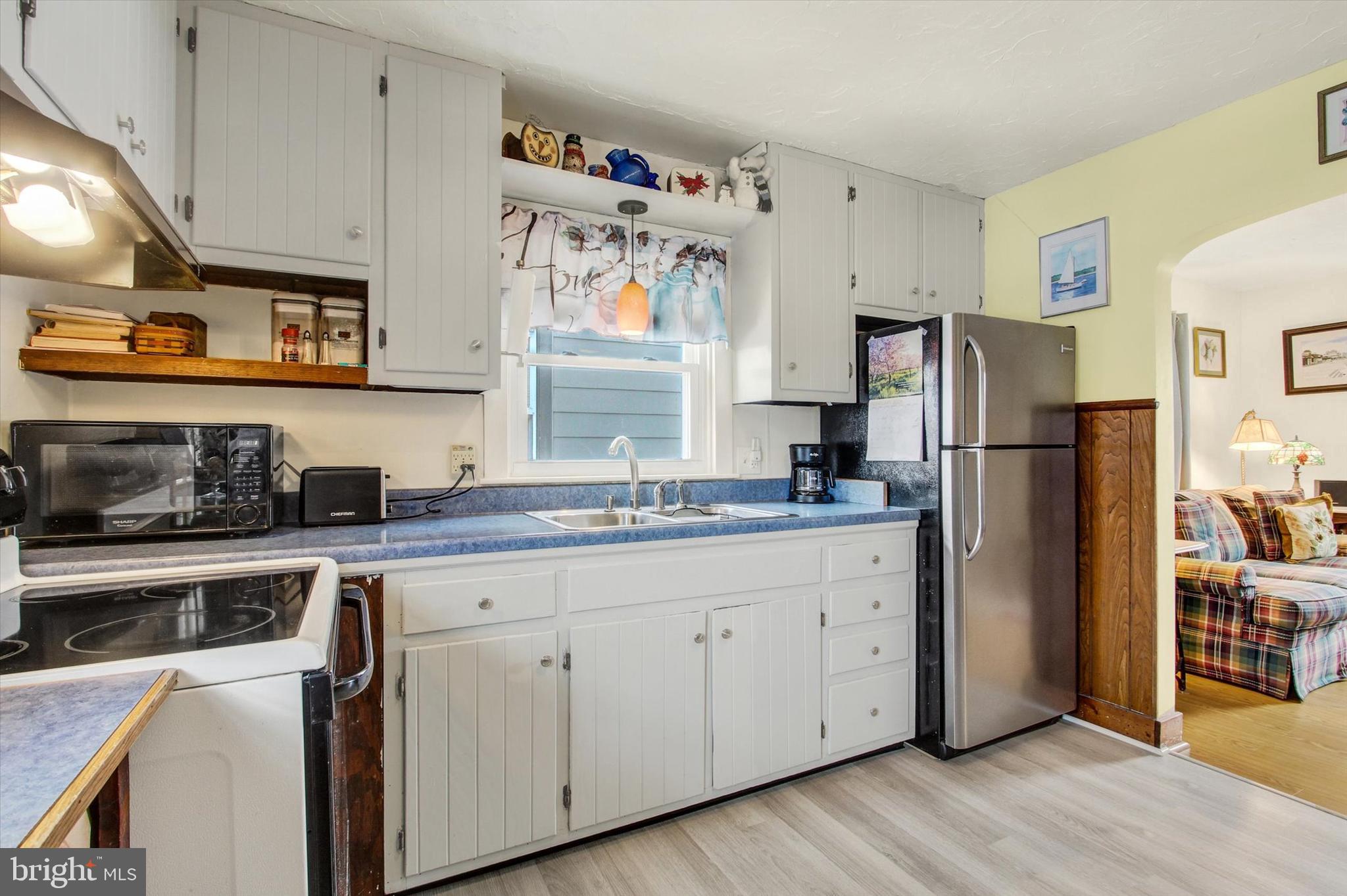 371 Maple Avenue Hanover, PA 17331 - Photo 14 of 24 a kitchen with stainless steel appliances granite countertop a refrigerator and a sink