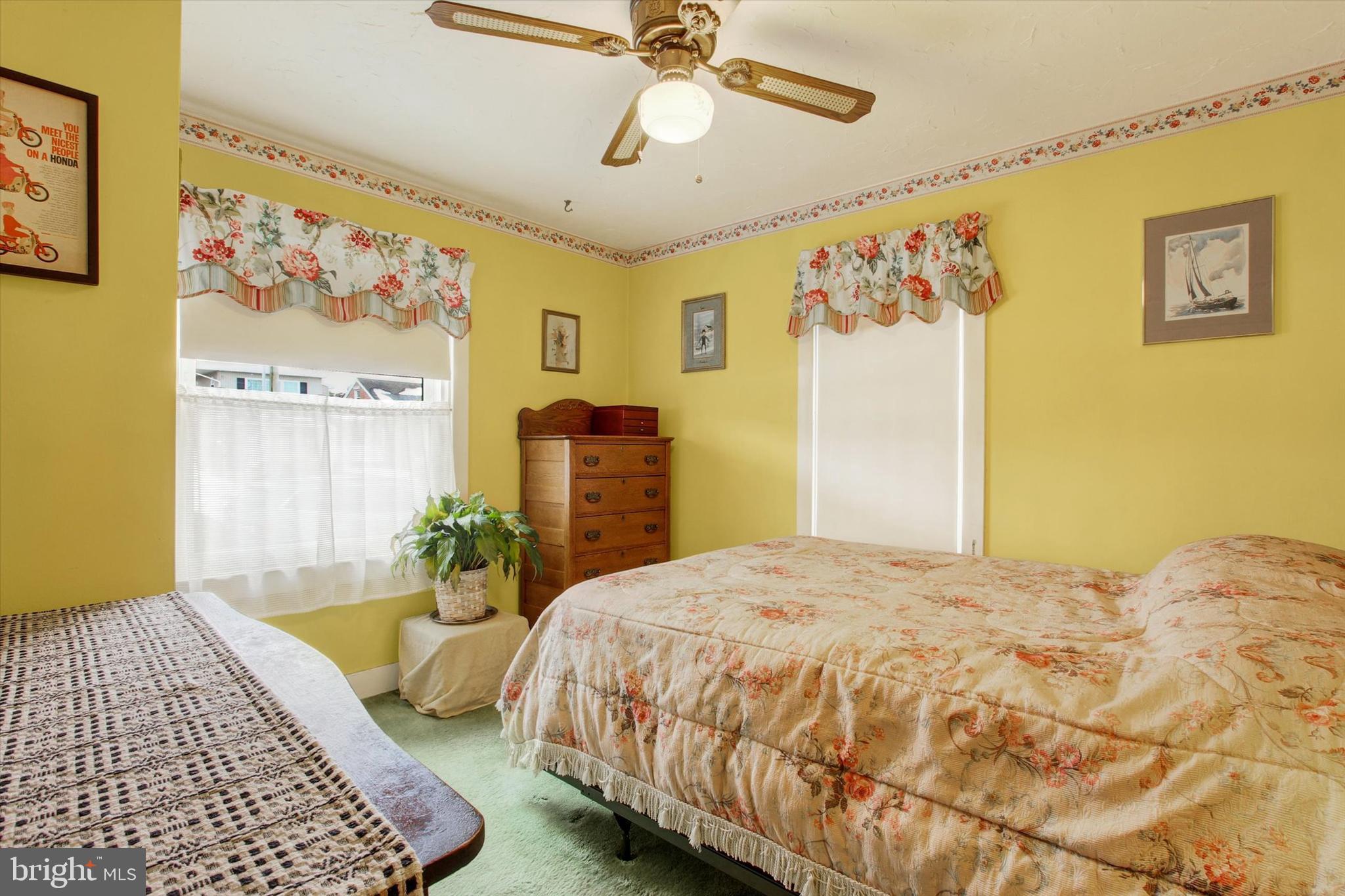 371 Maple Avenue Hanover, PA 17331 - Photo 15 of 24 a bedroom with a bed and a painting on the wall