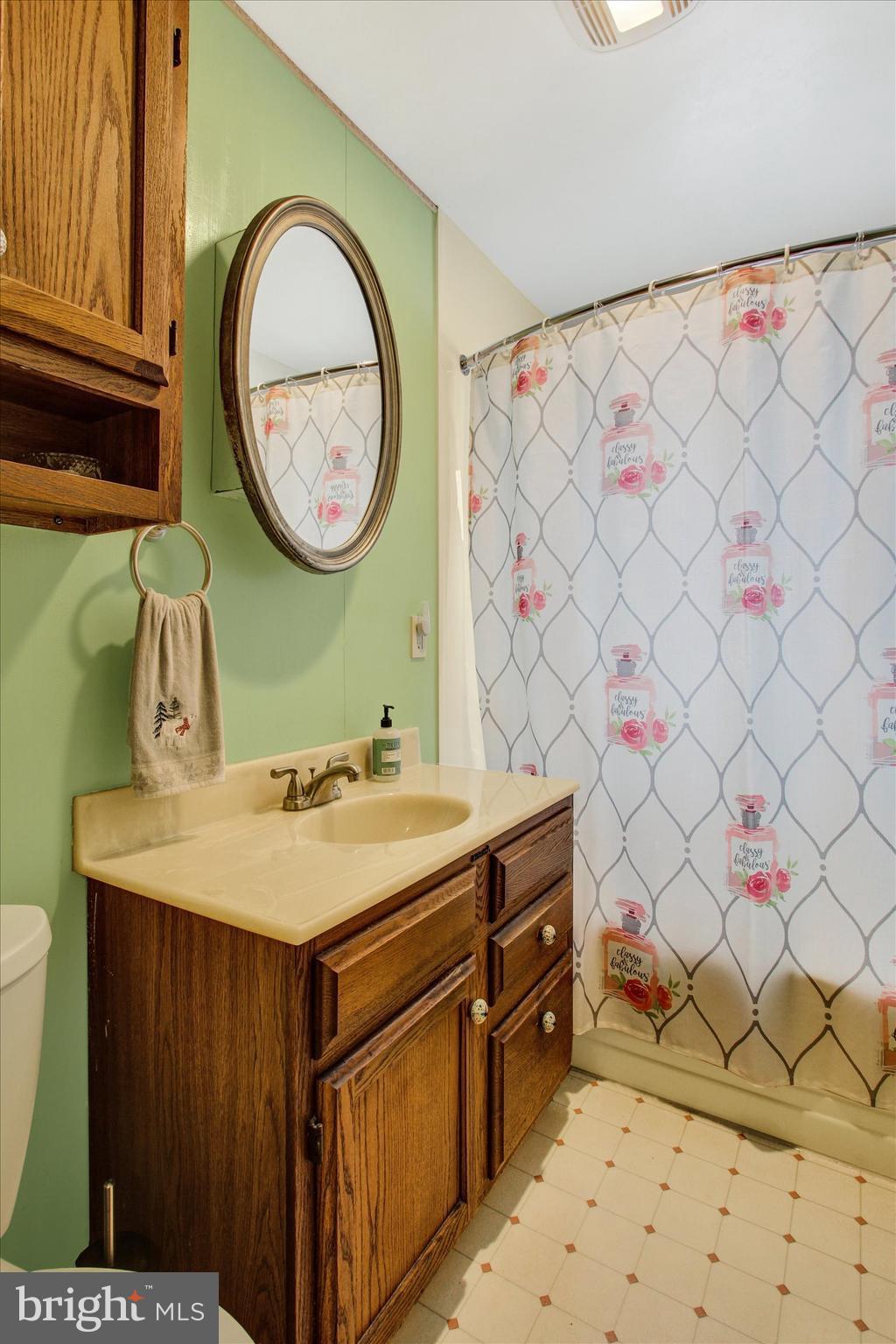 371 Maple Avenue Hanover, PA 17331 - Photo 16 of 24 a view of a kitchen with wooden cabinets and a table